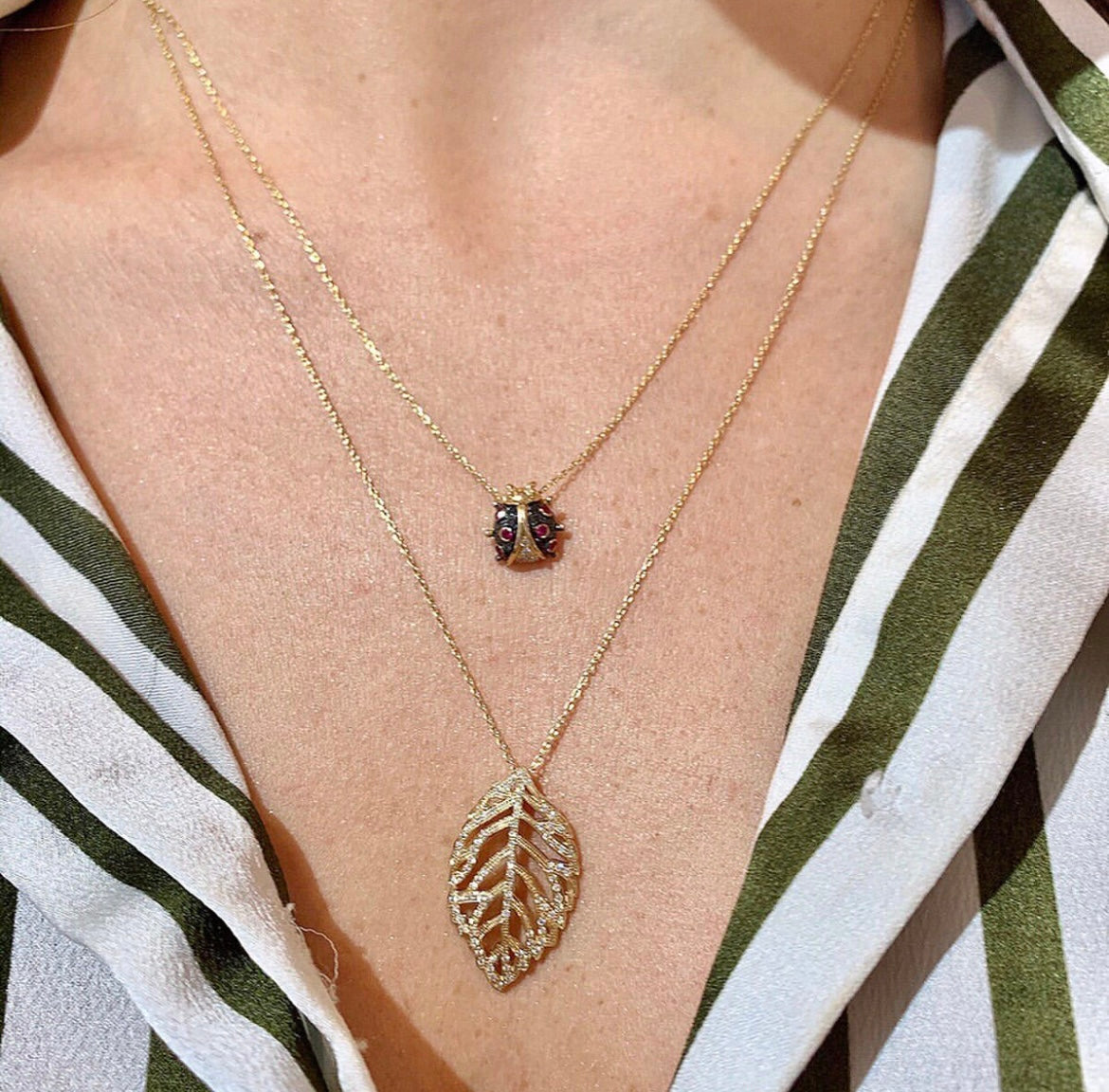 DIAMOND AND RUBY LADYBIRD AND LEAF PENDANT SET